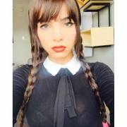 Kim fuentes dressing as Wednesday Addams for Halloween