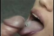 A thick load on her tongue close up
