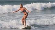 boob fell out while surfing