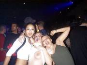 Showing her tit at the club