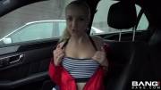 Flashing her tits in the car