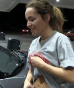 Shy girl in the gas station