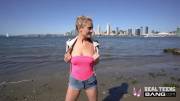 Shy Addie Andrews looks around before flashing her perky tits in public