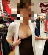 Wife showing off while shopping