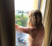 Naked in the hotel window