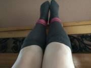 Gray knee high socks and pink cuffs