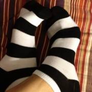 This photo exemplifies one reason I love socks. Look at how it accentuates her feet's curves.