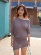 Pretty asian lady with a pretty outfit