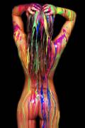 Bright and messy paint on a naked body
