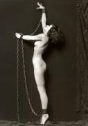 Nude in chains (Probably a Ziegfeld girl), circa 1920s.