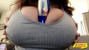 Crushing a can between my massive tits 