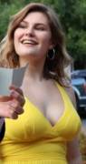 Braless in her yellow blouse. What cup size do you think she is?