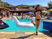 Flashing with a huge pool party going on behind her [IMG]