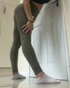 Yoga girl doing standing legs behind head (@x.leah.xo)