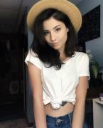 Pretty girl with a straw hat