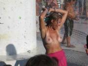 Topless girl at the Bonnaroo fountain