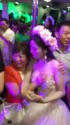 Chinese bride letting people grope her tits for money