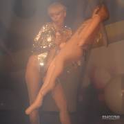 Miley cyrus sucking a fake dick, riding an even bigger fake dick and then letting fans rub her vagina