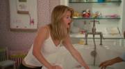 Alice Eve happily getting sprayed while revealing her wet t-shirt [gif]
