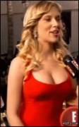 Scarlett Johansson gets embarrassed when her boob is unexpectedly squeezed on the red carpet [gif]