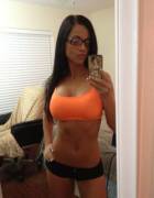 Cute athletic girl with glasses selfie