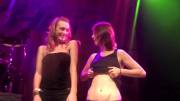 Flashing together and then touching tits during a concert (x-post from /r/OnStageGW)