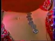 Bellydancer Flips Coins With Her Belly