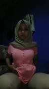 Muslim Girl in Bedroom Showing Assets 