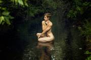 Nymph in a forest pool