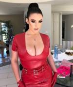Angela White in red latex