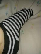 A friend in black and white striped ankle socks.