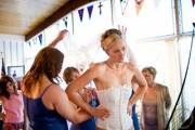 Bridesmaids go a little nuts helping bride get ready