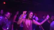 Drunk girl dancing at night club