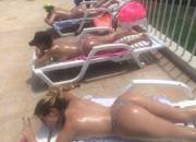 Big oiled asses on the sun