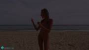 Clover dancing nude in the beach