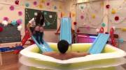 Guy with 9 schoolgirls in a lube-filled blow-up pool