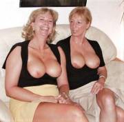 Two mature older ladies enjoying their open front tops