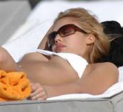 Jessica Alba relaxing while getting a nice tan