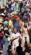 2 nude guys stroll through large crowd unnoticed. WTF?