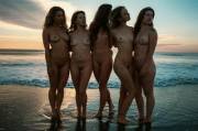 Five (5) naked ladies during sunset