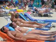 Topless Sunbathers