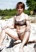 wife in a sheer bikini on a public beach