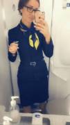 Flight attendant in the toilet.