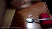 Tablespoon overflows with cum