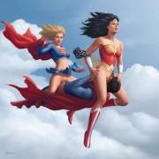 Supergirl and Wonder Woman sharing a ride. [Balziku]