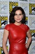 Lana Parrilla from the TV-series "Once upon a time" wearing a red leather dress and kind of poking through