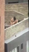Girls having fun on a balcony