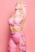 Gagged in rosy latex