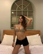 Saanya Khatter on the bed