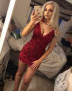 Red dress, cleavage, carrier bag
